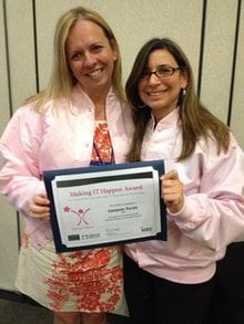 Catherine Poling, left, is shown being presented the 2013 Making IT Happen Award by Hilary Goldman of ISTE.